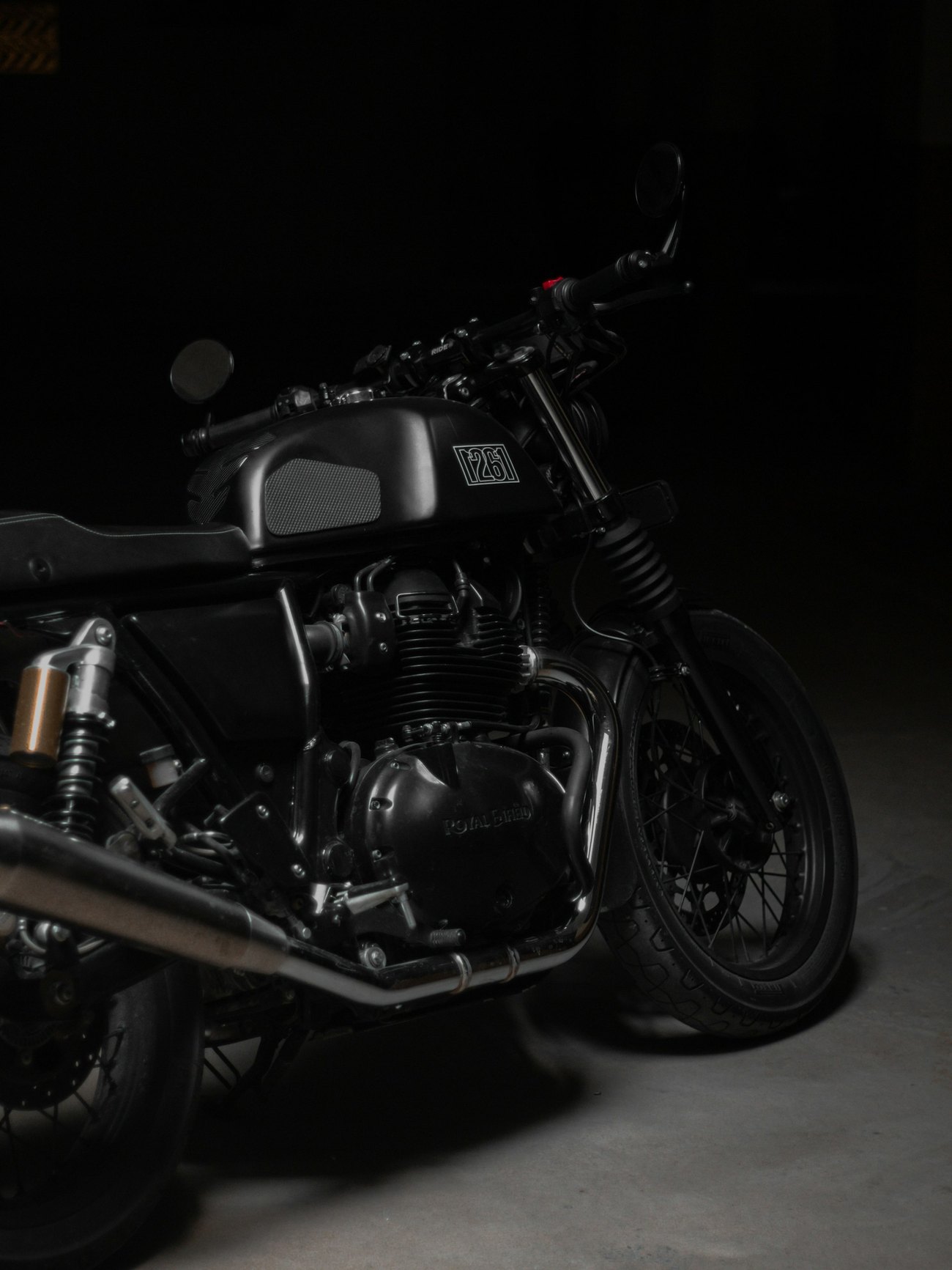 Classic motorcycle in shadow